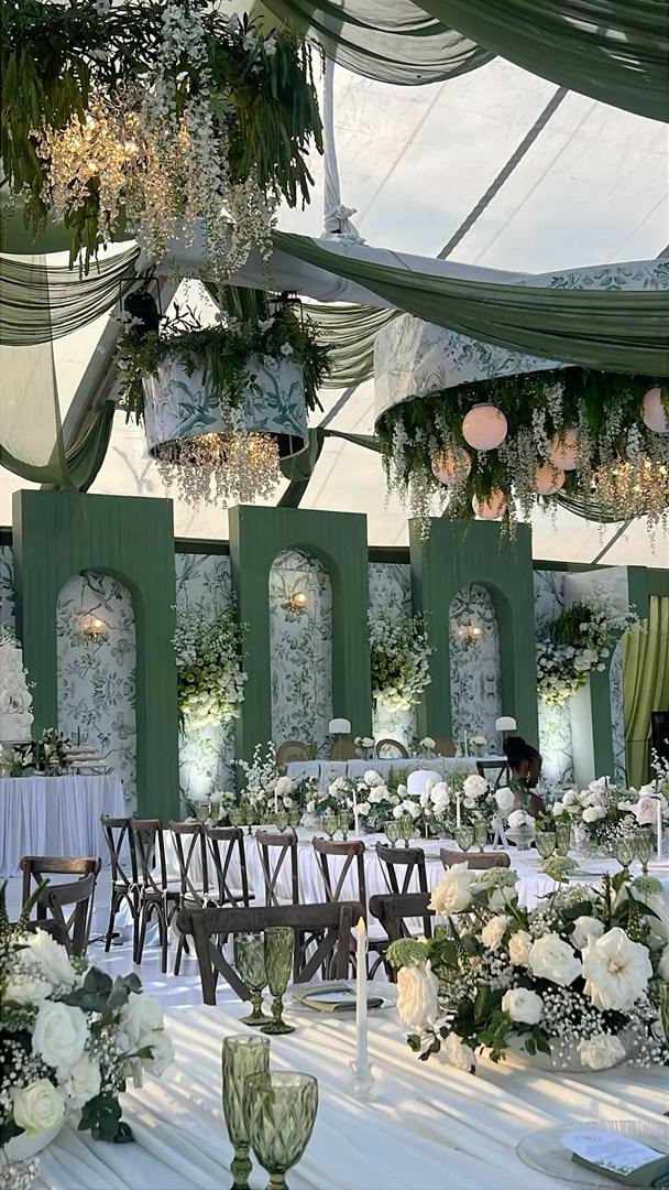 Green and white floral walkway installation