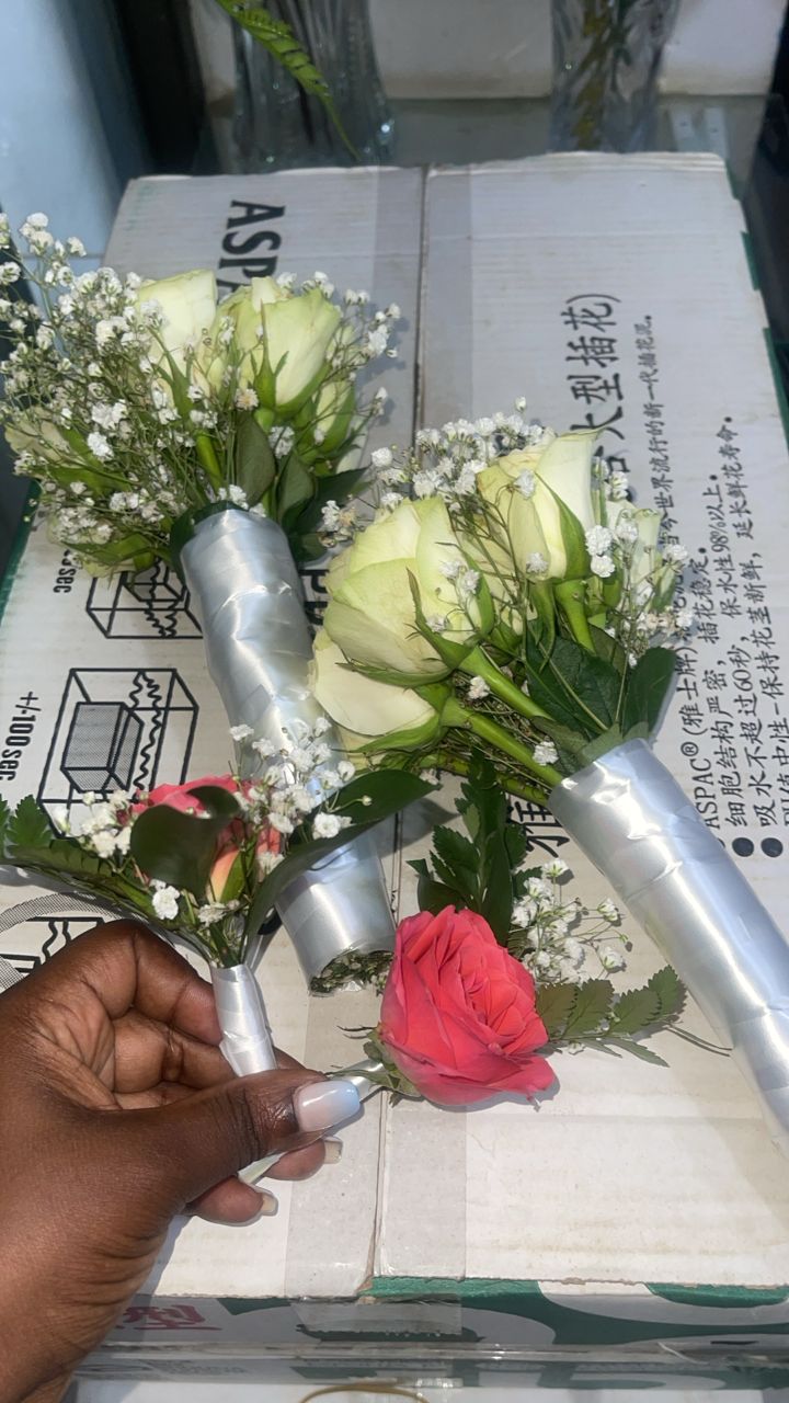 Hands-on floral bouquet arrangement