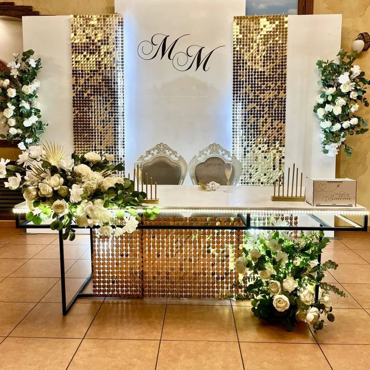Gold and white Kwanjula ceremony stage